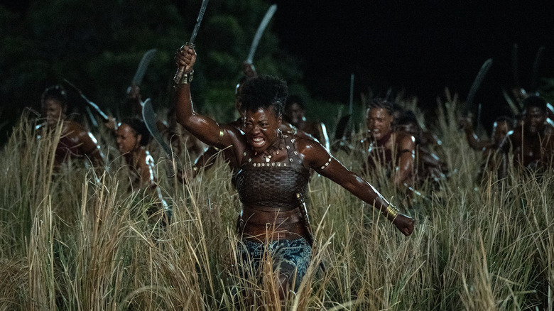 Viola Davis charging into battle in The Woman King