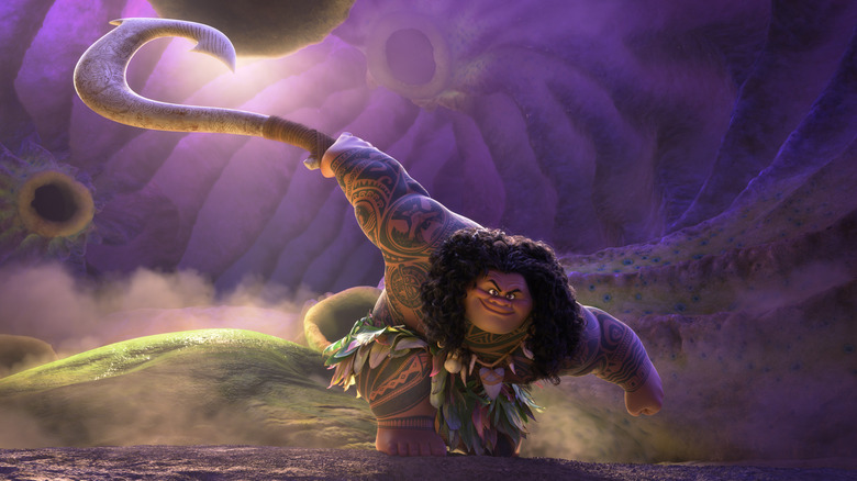 Dwayne Johnson as Maui holding his hook in Moana 2