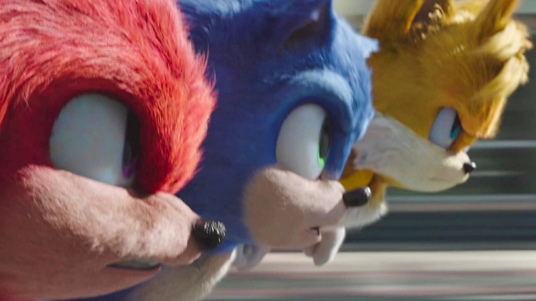 Knuckles, Sonic, and Tails, running very fast in Sonic the Hedgehog 3