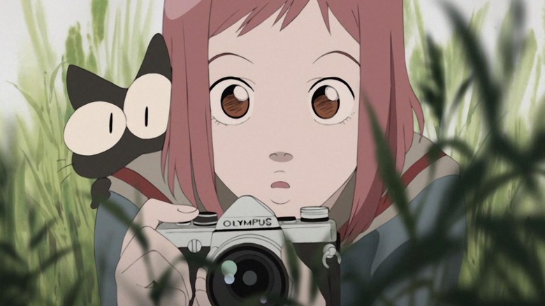 FLCL Mamimi holds camera