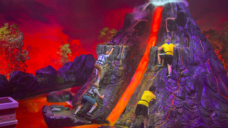 Players climb the volcano in Floor is Lava