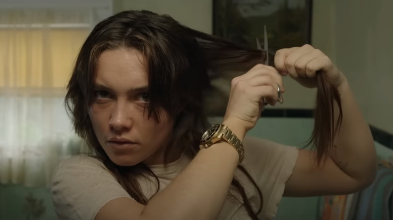 Florence Pugh cutting her hair in A Good Person