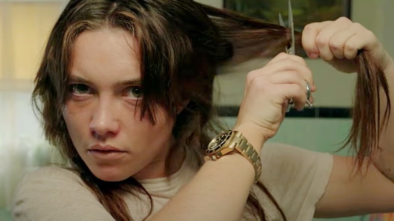 Florence Pugh cutting her hair in A Good Person