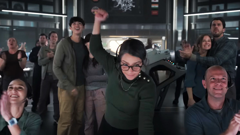 Sean Kaufman's Alex Poletov stands in Mars mission control surrounded by cheering staff in For All Mankind
