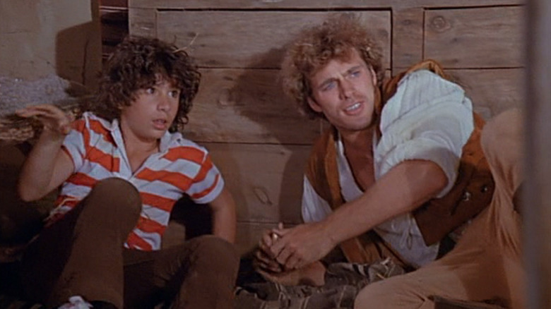 Jeffrey and Phineas collapsed against a wall on Voyagers!