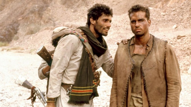 Steven Bauer as Khan Taj converses with Jason Patric as Konstantin Koverchenko in The Beast