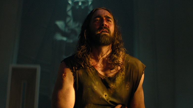 Brother Day wounded in tattered clothes in Foundation