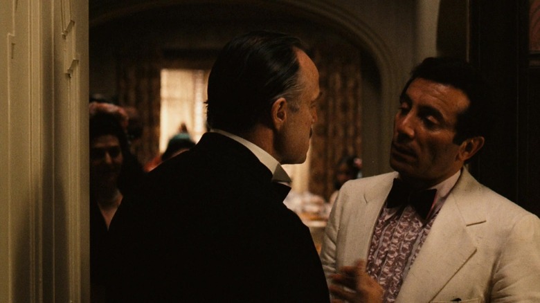 Al Martino's Johnny Fontane speaks to Marlon Brando's Vito Corleone in his office in The Godfather.jpg