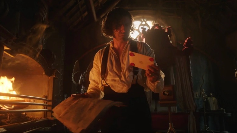 Frankenstein (2025) -- Victor Frankenstein throwing letters into furnace