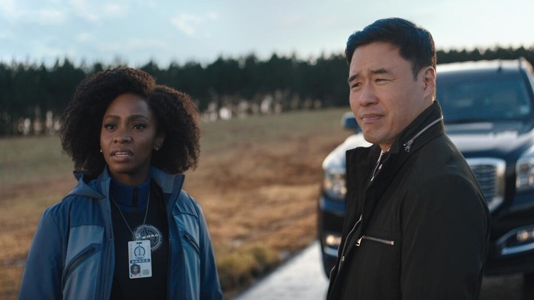 Teyonah Parris as Monica Rambeau stands shocked next to Randall Park as Jimmy Woo in WandaVision.