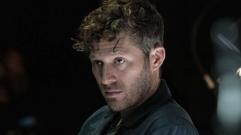 Zach Gilford as Elias Volt, scowling on Criminal Minds