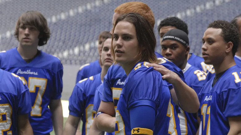 Tim Riggins (Taylor Kitsch) surrounded by his teammates on Friday Night Lights