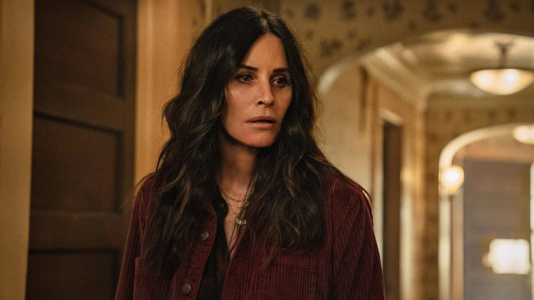 Shining Vale, Courteney Cox's Pat looking depressed in her new home's hallway