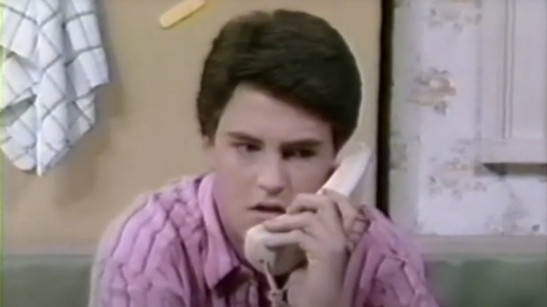 Matthew Perry's Charles Russell talks on a phone in Second Chance