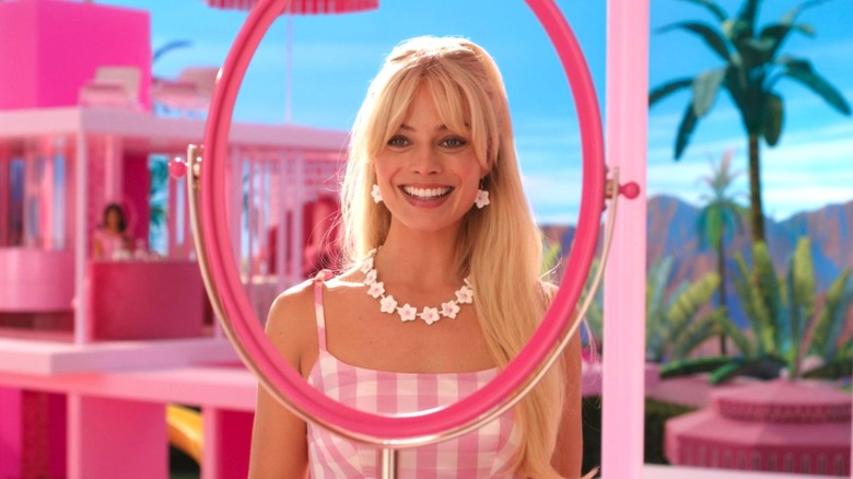 Margot Robbie as Barbie in her Barbieland mirror from Barbie