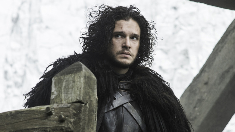 Jon Snow wearing a furry cloak in Game of Thrones