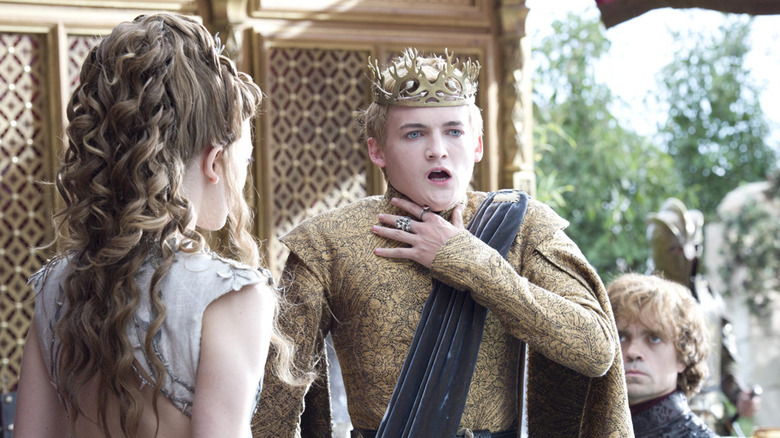Joffrey choking at his wedding in front of Margaery and Tyrion on Game of Thrones