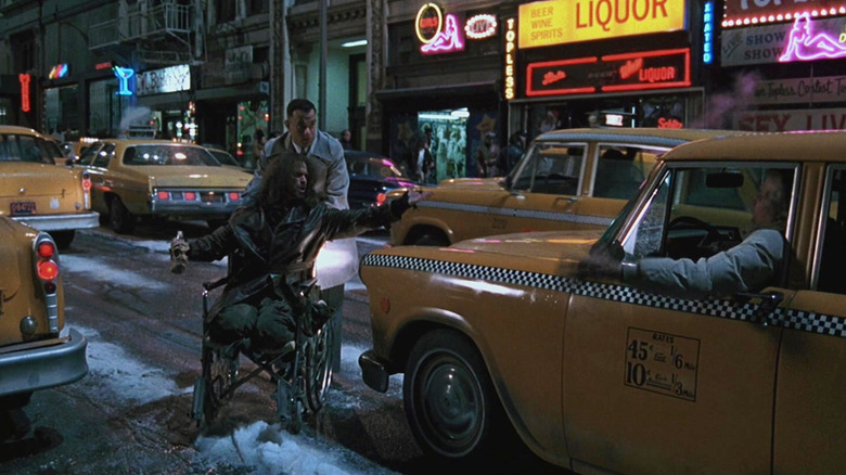 Gary Sinise as Lt. Dan and Tom Hanks as Forrest crossing a busy street in Forrest Gump