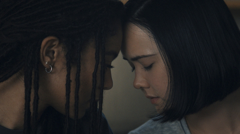 Jaz Sinclair as Marie Moreau and London Thor as Jordan Li sharing a tender moment on Gen V