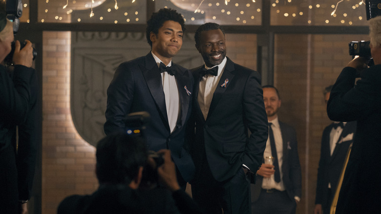 Chance Perdomo as Andre Anderson and Sean Patrick Thomas as Polarity posing for photos in tuxedos in Gen V season 1