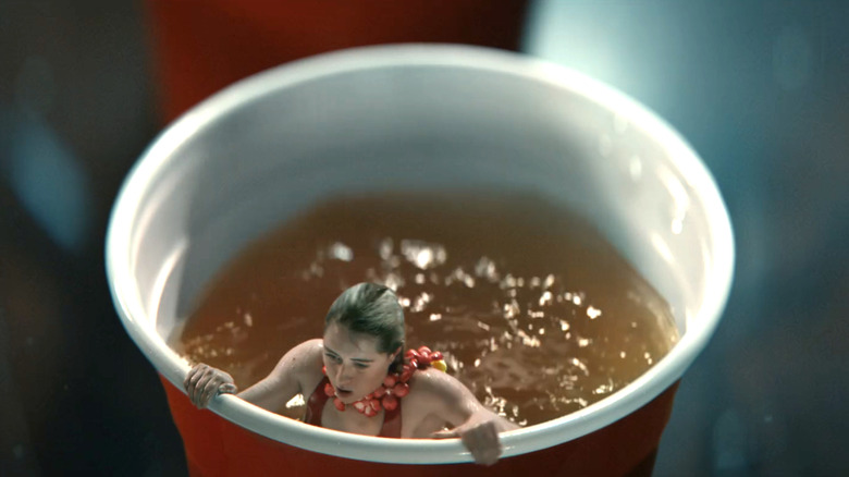 Gen V, Emma, shrunken down, hanging out in a cup of beer