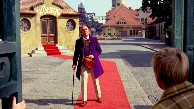 Willy Wonka Walks Out to His Guests with a Cane