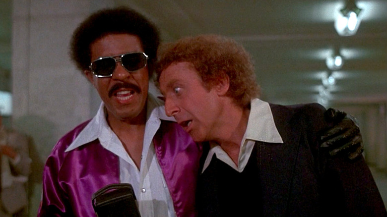 Richard Pryor and Gene Wilder walk together in Silver Streak