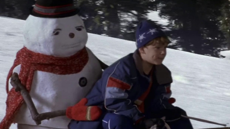 Jack Frost puppet and Joseph Cross as Charlie Frost sledding in Jack Frost