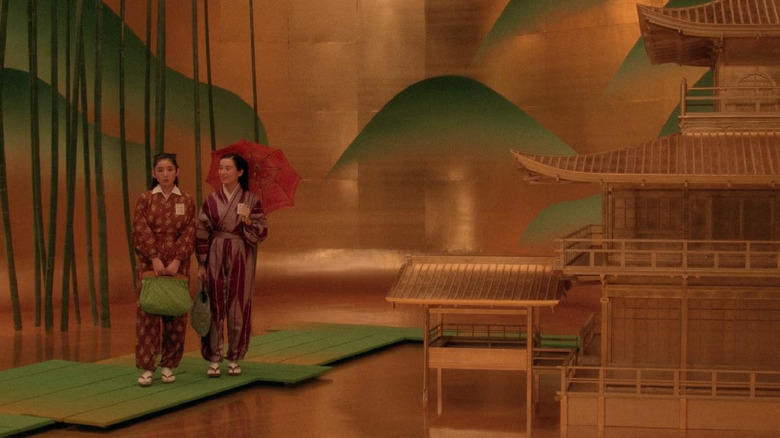 A storybook house and two women on a fake pond in Mishima: A Life in Four Chapters