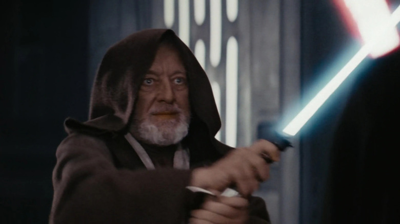 Obi-Wan Kenobi fighting with a lightsaber in Star Wars: A New Hope
