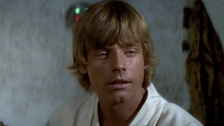 Mark Hamill as Luke Skywalker looking thoughtful in Star Wars: A New Hope