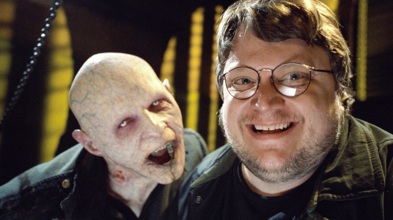 Guillermo del Toro on Blade II set with actor in vampire makeup