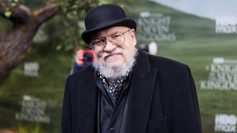George R.R. Martin wearing a hat at the premiere of A Knight of the Seven Kingdoms