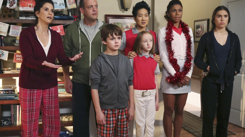 Debby, Marty, Max, Dick, Abby, Jackie, and Amber standing next to each other on The Neighbors