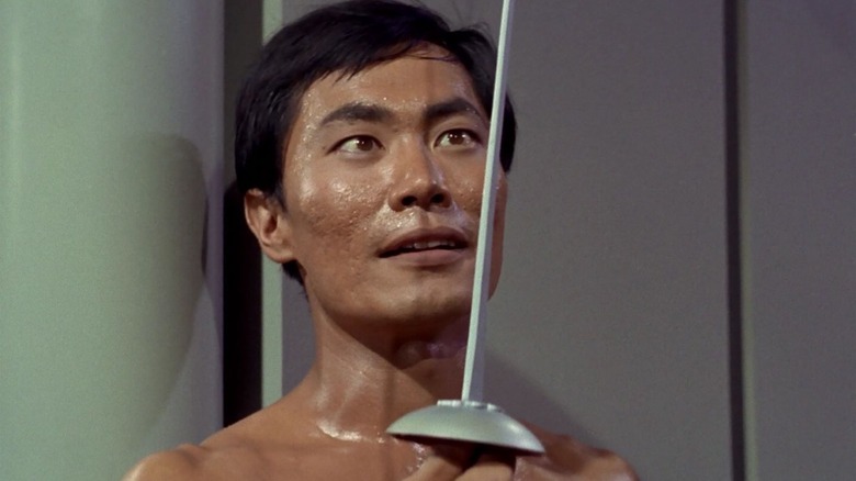 Sulu holding a fencing foil in Star Trek