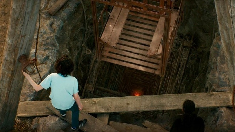 Tevor (Finn Wolfhard) gazes into Shandor's mine in 'Ghostbusters: Afterlife"