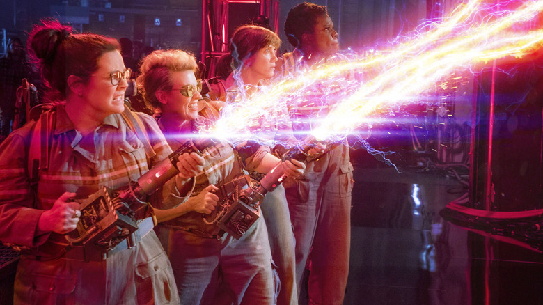 The Ghostbusters using their proton packs in Answer the Call