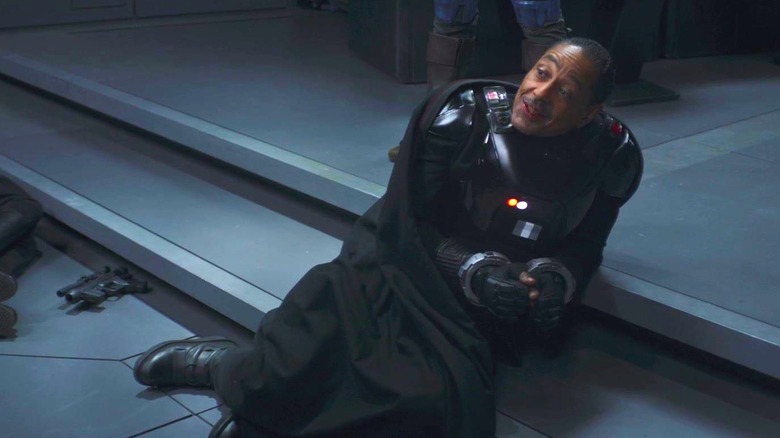 Moff Gideon lounging on the floor/stairs looking sassy