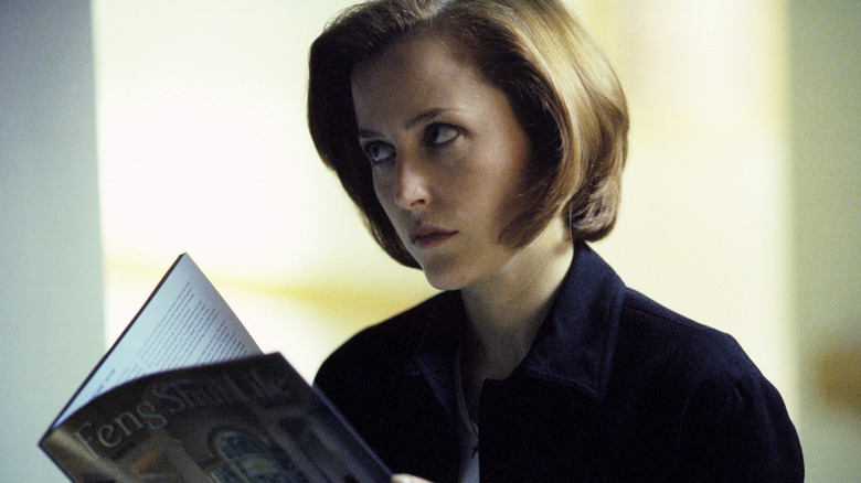 Scully reading a magazine on The X-Files.