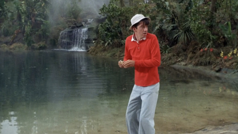 Bob Denver's Gilligan stands by the lagoon in Gilligan's Island