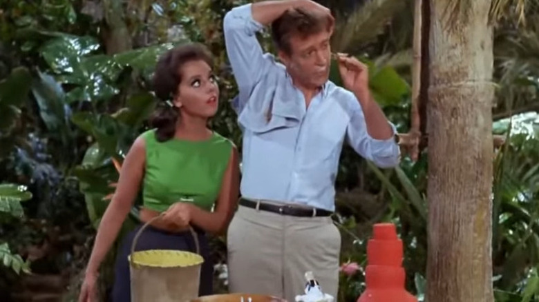 Mary Ann (Dawn Wells) watching the Professor (Russell Johnson) shaving on Gilligan's Island