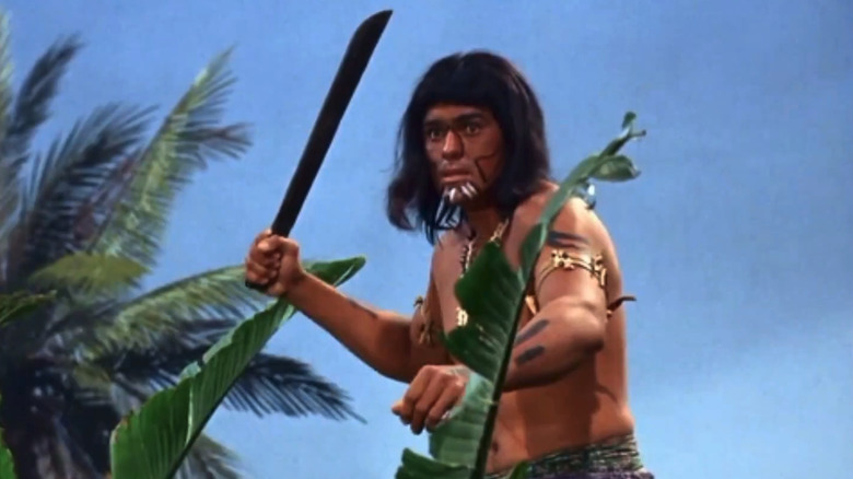 Roman Gabriel's headhunter holds a sword in Gilligan's Island
