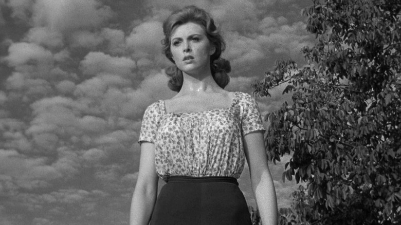 Tina Louise as Griselda Walden looking down in concern in God's Little Acre