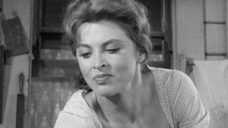 Tina Louise as Griselda Walden looking downwards in God's Little Acre