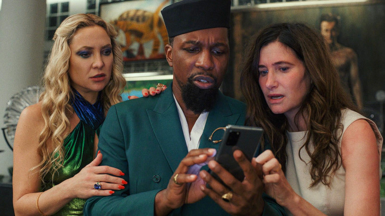 Kate Hudson, Leslie Odom Jr. and Kathryn Hahn in Glass Onion: A Knives Out Mystery