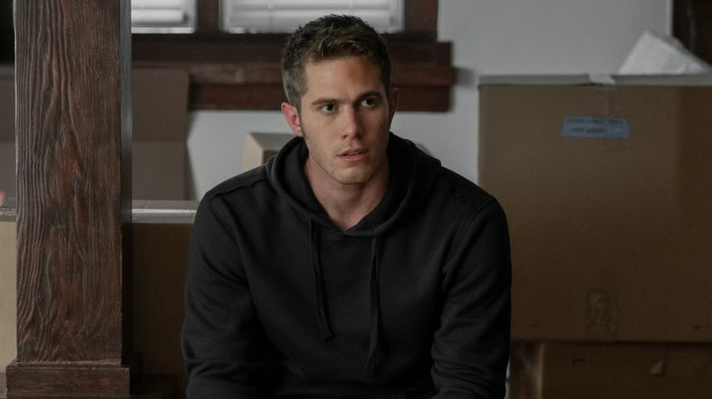 Blake Jenner as Sean, looking concerned in What If