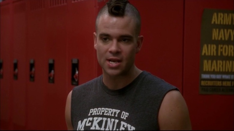 Mark Salling as Noah "Puck" Puckerman, in the locker room on Glee