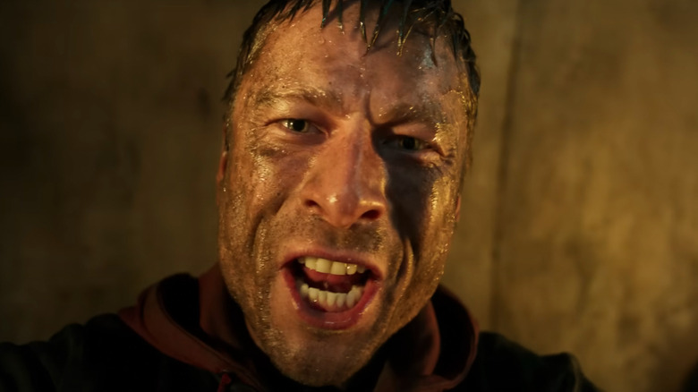 Glin Powell in the role of Ben Richards seems to smell sweat and discomfort in the running man (2025)
