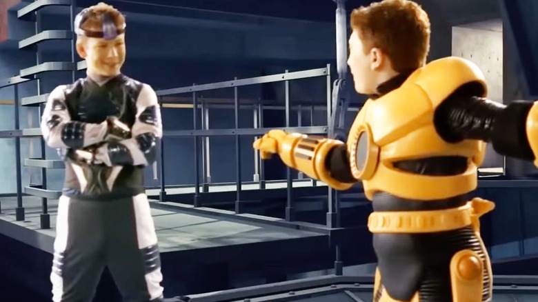 The Long-Fingered Boy talks to Juni inside a computer simulation in Spy Kids 3-D: Game Over