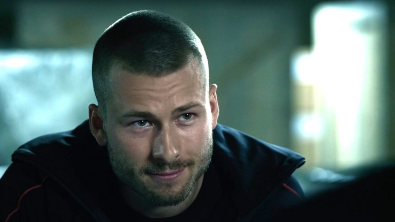 Thorn smiling at Barney Ross in The Expendables 3